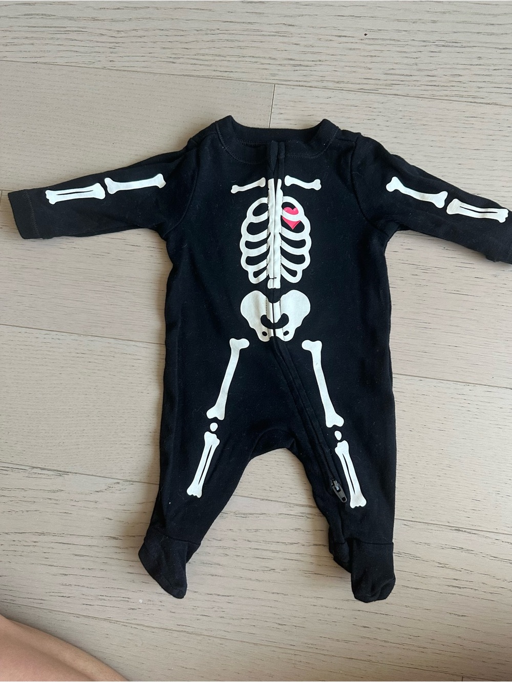Old Navy Black Skeleton Footed One-Piece with Pink Heart Detail